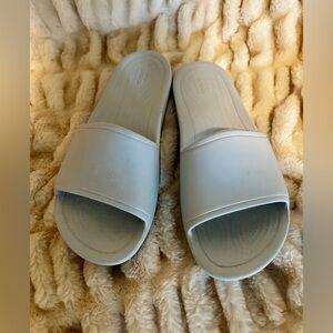 Size 10 Croc slides, light blue, worn once.